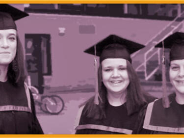 Graduate students in cap and gown