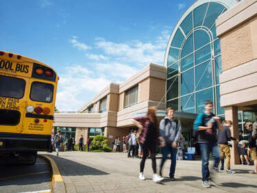 School bus, Students in front of school
