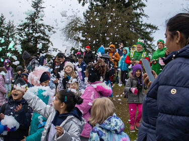 Elves Greeting Elementary Families at John Maclure